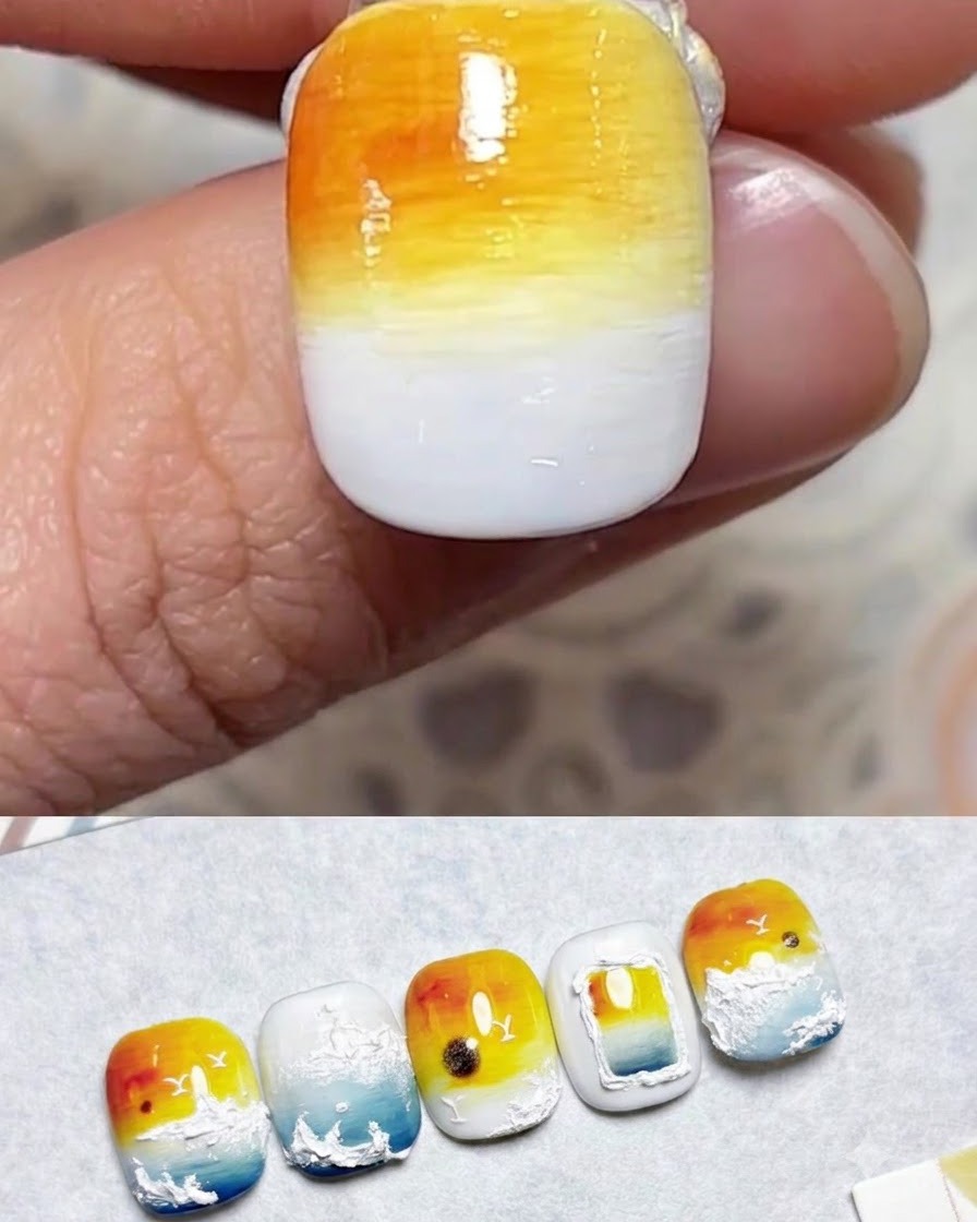 손톱 하단 절반에 라이트 블루 젤이 도포된 모습.