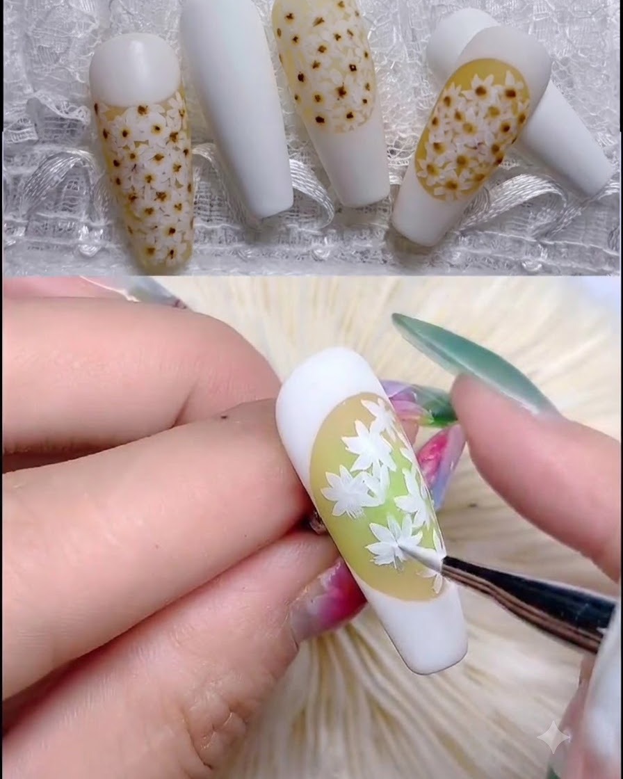 화이트 데이지 꽃잎 중앙에 연한 핑크 반투명 도트를 파인 브러시로 찍는 모습.